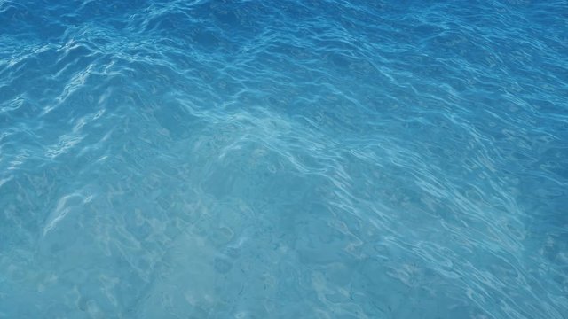 Pearl inside a seashell. Beautiful pearl in the shell on the seabed. Rays of sunlight shining from above penetrate deep clear blue water. Caustic effect in the seabed. Sunlight beams underwater. 4K