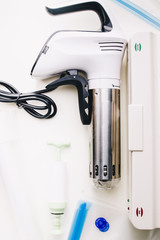 Sous vide stick or rooner close up, top view of a modern utensil for the sous vide cooking...