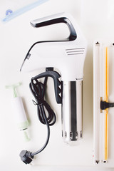 Sous vide stick or rooner close up, top view of a modern utensil for the sous vide cooking technique, ooner,  precision immersion circulator. Isolated on clean background. 