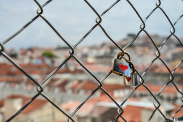 Locks on the fence of the bridge in lisbon