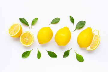 Fresh lemon with leaves isolated on white