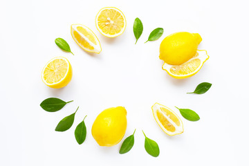 Fresh lemon with leaves isolated on white
