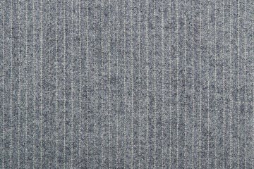 Fototapeta na wymiar Light grey woolen fabric with pinstripes or chalk stripes background
