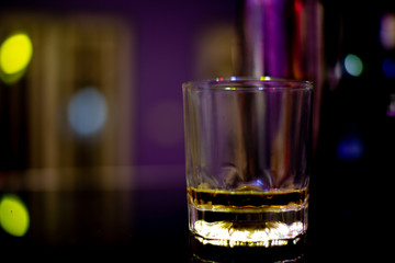  Whiskey in a glass in the bar , glass of whiskey