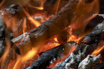 Close up of flaming wood embers