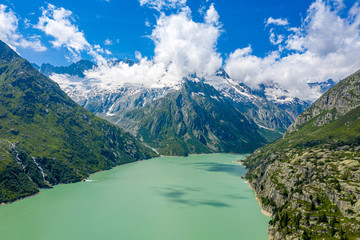 Fototapeta na wymiar Mountain Lake in the Swiss Alps - Switzerland from above