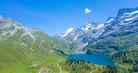 Naklejka na ściany i meble Beautiful mountain lake in the Swiss Alps - Switzerland from above