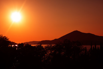 tropical sun over the sea and island