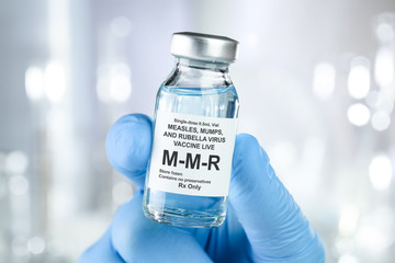 Small drug vial with MMR vaccine - obrazy, fototapety, plakaty