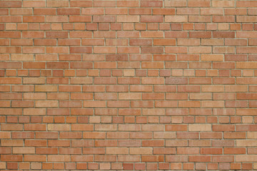 Attractive but grungy rose beige color brick wall texture background