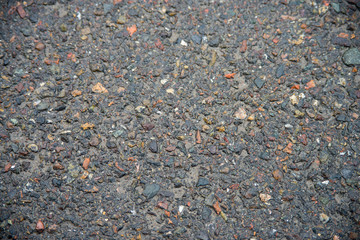 wet black asphalt road texture, dark background
