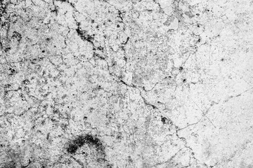 Texture of a concrete wall with cracks and scratches which can be used as a background