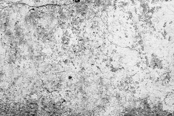 Texture of a concrete wall with cracks and scratches which can be used as a background