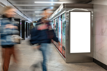 Mock up lightbox in underpass. Blurred movement people against background lightbox layout....