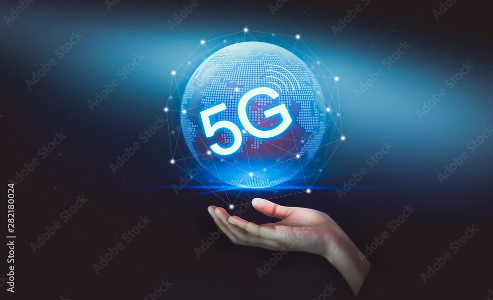Poster hand holding the 5g hologram, wireless systems and internet of thing in future and standard of moder