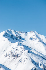 mountains in winter, snow capped peaks, mountain winter landscape