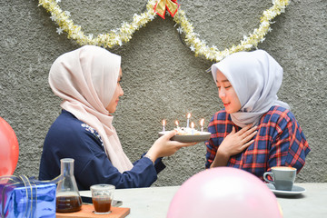 Portrait of two hijab woman bestfriend having time together in celebrate event