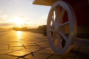 Close up of wheel of wooden carriage