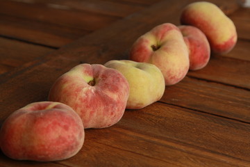 Paraguayan peach on wooden background