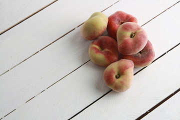 Paraguayan peach on wooden background