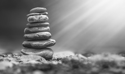 Closeup of stone balance on rock in the river, Pyramid of river stones.