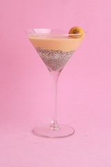 glass with chia and medlars pudding