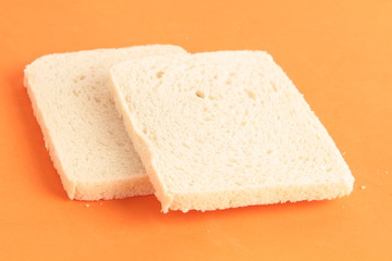 bread without rind in colorful background..