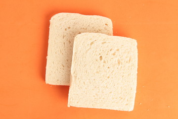 bread without rind in colorful background..