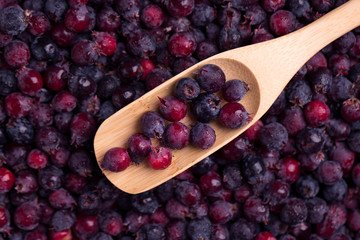 Shadberry  in a spoon close-up. Blueberry closeup. Fresh berry.