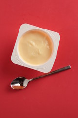 custard packed in plastic container
