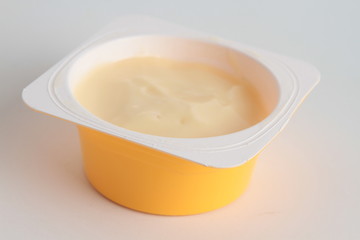 custard packed in plastic container