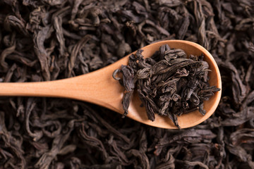 Loose leaf tea. Loose tea in a spoon close-up.