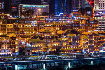 Hongya cave in Chongqing with modern skyline and skyscrapers in the background