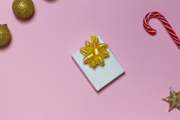 white box on white background. gift with yellow bow. top view with space. Christmas decorations,...