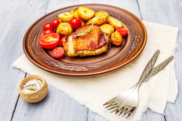 Roast chicken thighs and baby potatoes