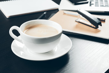 Close up of a coffee mug on office table interior