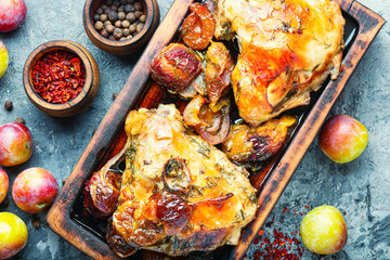 Roasted chicken stuffed with plum
