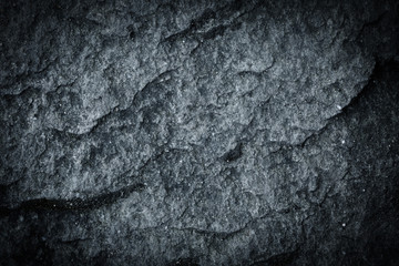 Dark grey slate background or natural stone texture, rock wallpaper