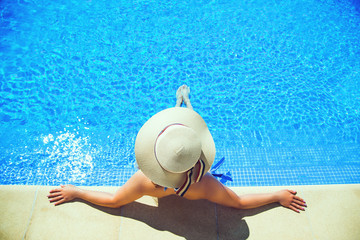 Woman in swimming pool. 