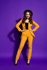 Vertical full length body size view of her she nice-looking attractive cheerful cheery content luxury wavy-haired lady hands on hips isolated over bright vivid shine violet lilac background