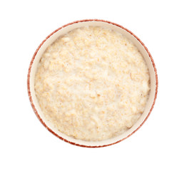 Bowl with tasty oatmeal on white background