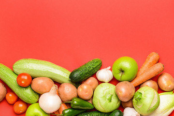 Assortment of fresh vegetables on color background