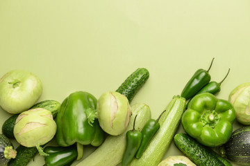Assortment of fresh vegetables on color background