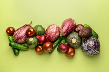 Assortment of fresh vegetables on color background