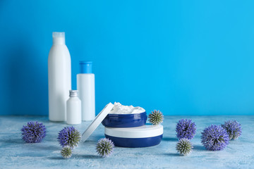 Body cream in jars on table