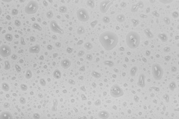 Water drops on glass background.