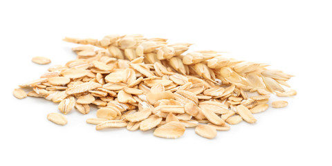 Heap of raw oatmeal on white background