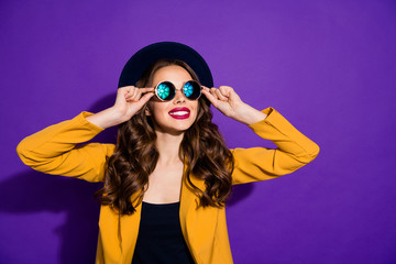 Photo of amazing lady looking far away wear stylish hat yellow costume isolated purple background