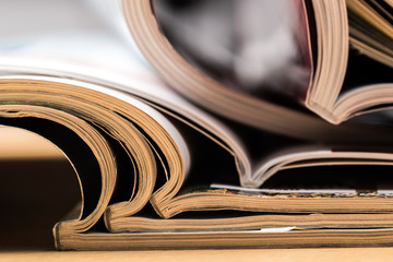 selective focus of the stacking magazine place on white background