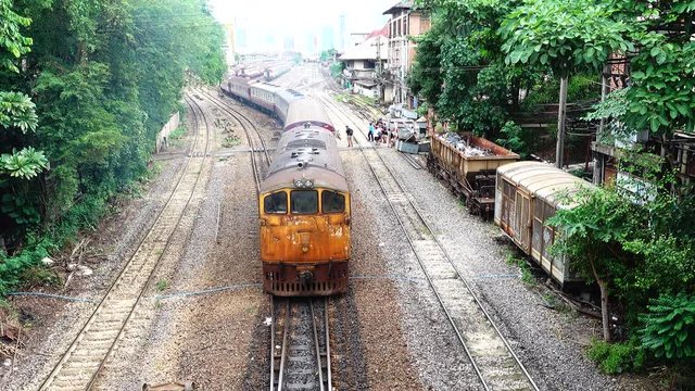 4K Diesel train Running the old 105-year-old railway tracks transporting people, transportation systems in the city